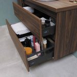 brown wooden cabinet with drawer
